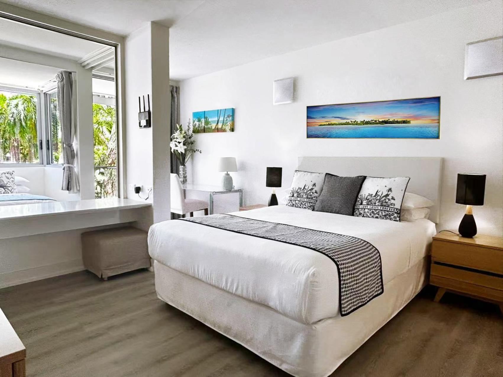Palm Cove Beachside Apartments - Pool And Garden Views Exterior photo